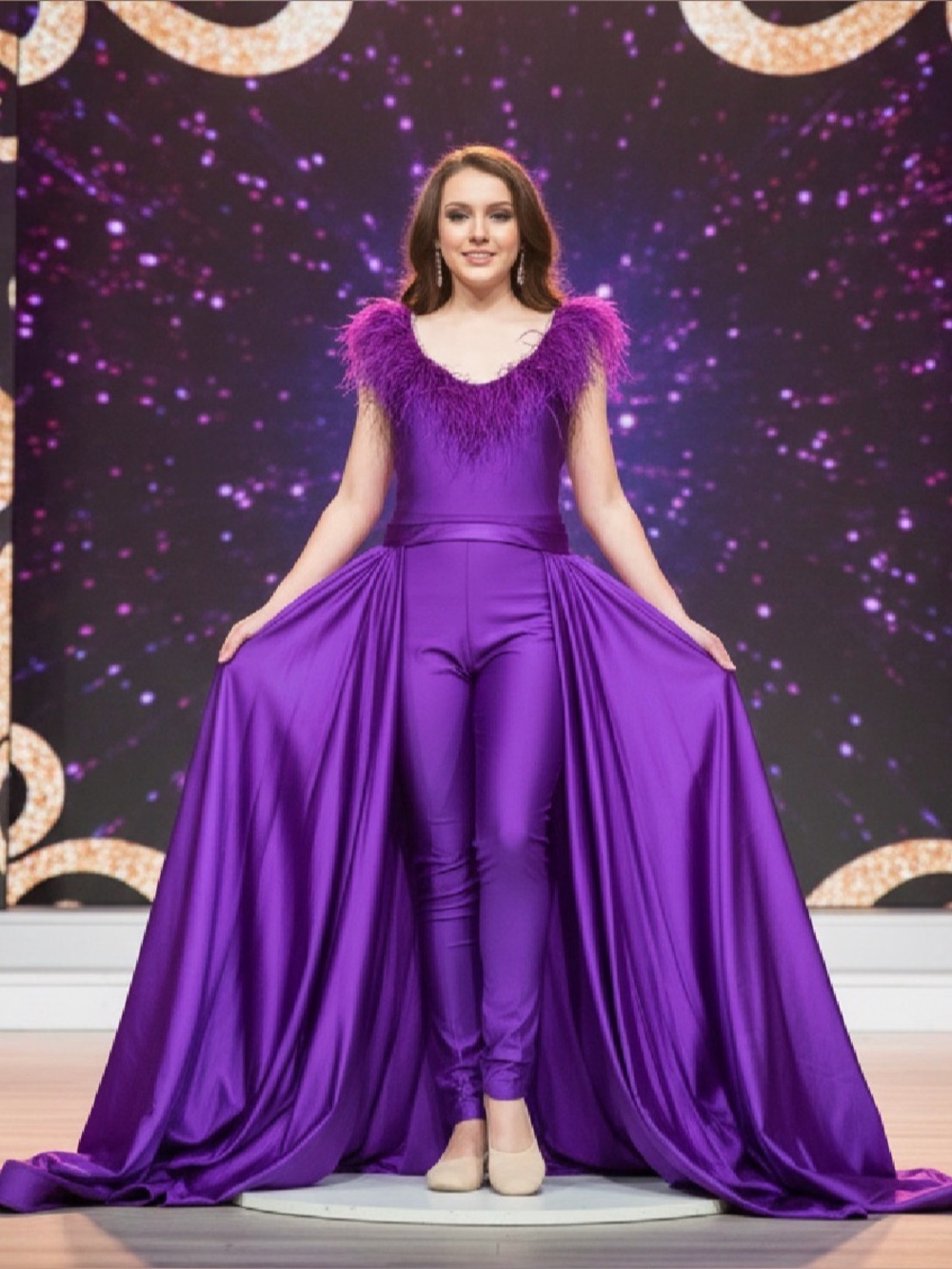 Jessica Angel Feather-Trim Purple Jumpsuit with Dramatic Draped Train